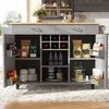 A kitchen island with various items stored on its shelves, including wine bottles, coffee bags, and kitchenware. Podgląd zdjęcia produktu