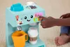 A child's hand is shown interacting with a toy coffee maker. Náhľad obrázku produktu