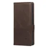 A dark brown leather phone case is shown standing upright against a white background. Anteprima dell’immagine prodotto