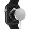 The back of an Apple Watch is shown with a magnetic charger attached. Produktbild-Vorschau