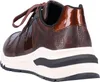 A rear view of a brown women's sneaker with a textured finish and patent leather accents. Produktbild-Vorschau