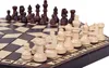 A chess set with pieces arranged on the board. Anteprima dell’immagine prodotto