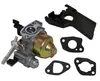 A carburetor and its associated gaskets and mounting bracket are laid out on a white background. Produktbild-Vorschau
