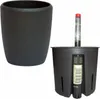 A dark gray speckled planter pot and a disassembled self-watering planter system are shown against a white background. Produktbild-Vorschau