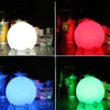 A collage of four images showing a glowing spherical LED lamp in different colors (white, red, blue, green) with glasses and drinks in the background. Náhľad obrázku produktu