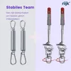 Image shows two sets of hanging accessories, one with springs and carabiners, the other with ceiling hooks and swivels, with text overlays. Produktbild-Vorschau