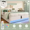 A bed with LED lighting and storage features, presented in a bedroom setting with decorative elements. Produktbild-Vorschau
