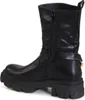 A black leather boot with a chunky sole and a gold chain detail. Produktbild-Vorschau