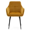 A mustard yellow upholstered chair with black legs, shown from the front against a white background. Podgląd zdjęcia produktu