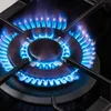 A close-up view of a gas burner on a stovetop with blue flames. Náhľad obrázku produktu