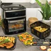 A kitchen counter scene featuring an air fryer and various cooked foods. Produktbild-Vorschau