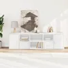 A white modular shelving unit with doors and drawers, decorated with a painting, a lamp, and decorative objects. Anteprima dell’immagine prodotto