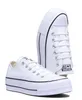 A pair of white Converse platform sneakers on a white background. Voir les images du produit