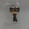 A Funko Pop figurine of Yennefer from The Witcher, wearing a black dress and a black lace mask, is displayed in its clear plastic packaging. Podgląd zdjęcia produktu