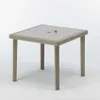 A square outdoor table with a woven rattan-like base and a smooth top, shown against a white background. Anteprima dell’immagine prodotto