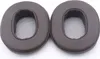 A pair of brown ear pads for headphones. Podgląd zdjęcia produktu