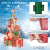 A decorative stack of LED-lit gift boxes in a snowy outdoor setting, with inset images highlighting stability features. Produktbild-Vorschau