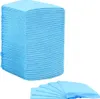 A stack of light blue disposable puppy training pads is shown on a white background, with a few pads fanned out in the foreground. Náhled obrázku produktu