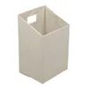A beige fabric storage bin with a cut-out handle on a white background. Podgląd zdjęcia produktu