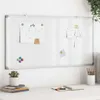 A whiteboard with a calendar and notes attached, placed on a wall above a desk with office supplies. Produktbild-Vorschau