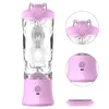 A pink and clear portable blender is shown against a white background. The image includes multiple views of the blender, highlighting its lid, power button, and blades. Produktbild-Vorschau