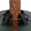 Close-up of a tree trunk secured in a green Christmas tree stand with black adjustable clamps and metal wires. Náhľad obrázku produktu