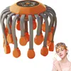 A product image showing a head massager with a model demonstrating its use. Produktbild-Vorschau
