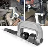 Collage of images showing a ball joint separator tool being used on a car's suspension and a close-up of the tool itself. Produktbild-Vorschau