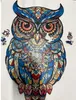 A colorful wooden owl puzzle is shown on a white background. Náhled obrázku produktu