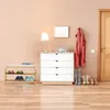 An entryway with a shoe rack, a chest of drawers, and a coat rack. Produktbild-Vorschau