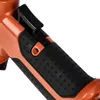 Close-up of the handle and trigger of an orange power tool. Produktbild-Vorschau