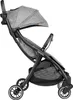 A side view of a gray baby stroller against a white background. Produktbild-Vorschau