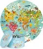A circular world map puzzle and its round tin packaging are shown. Podgląd zdjęcia produktu