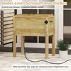 A wooden cooler box with a hose attached, placed on a patio. Podgląd zdjęcia produktu