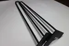Four black hairpin legs are laid out diagonally on a white surface. Produktbild-Vorschau