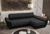 A dark gray and black sectional sofa is shown in a living room setting. Náhľad obrázku produktu