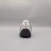 A rear view of a silver Puma shoe against a plain gray background. Voir les images du produit