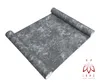 A roll of wallpaper with a marble-like pattern is shown on a white background. Anteprima dell’immagine prodotto