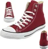 A collage of three images of a pair of red Converse Chuck Taylor All Star high-top sneakers against a white background. Produktbild-Vorschau
