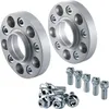 Two silver wheel spacers and a pile of silver lug bolts on a white background. Náhled obrázku produktu