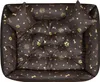 A top-down view of a dog bed with a bone and paw print pattern. Anteprima dell’immagine prodotto