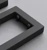 A close-up view of a black metal shelf bracket with visible screws. Produktbild-Vorschau