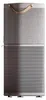 A studio shot of a two-tiered air purifier with a fabric-covered top section and a mesh-covered bottom section, featuring a leather handle on top. Podgląd zdjęcia produktu