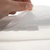 A hand is shown opening a waterproof bag, revealing velcro closures. Náhled obrázku produktu