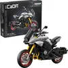 A model of a Suzuki Katana motorcycle is displayed next to its packaging. Voir les images du produit