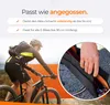 A cyclist riding a bike with an orange background and a close-up of a hand holding a product. Anteprima dell’immagine prodotto