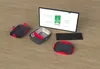A heated lunchbox, keyboard, and tablet are arranged on a wooden surface. Produktbild-Vorschau