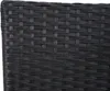 A close-up view of black woven rattan material. Produktbild-Vorschau