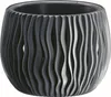 A dark gray, wavy patterned planter pot is shown against a white background. Náhľad obrázku produktu