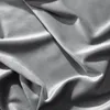 A close-up, draped view of a gray velvet fabric. Produktbild-Vorschau